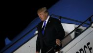 U.S. President Donald Trump disembarks Air Force One as he arrives in Singapore June 10, 2018. REUTERS/Jonathan Ernst
