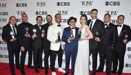 Cast and creative team of 'The Band's Visit' pose in the 72nd Annual Tony Awards Media Room at 3 West Club in New York City on June 10, 2018. / AFP / ANGELA WEISS