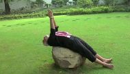 This screenshot taken from a video posted on India Prime Minister twitter handle, shows Indian Prime Minister Narendra Modi performing Yoga following a fitness challenge in New Delhi on June 13, 2018. AFP 