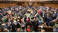 A video grab from footage broadcast by the UK Parliament's Parliamentary Recording Unit (PRU) shows members of the Scottish National Party (SNP) walking out during Prime Minister's Questions (PMQs) in the House of Commons in London on June 13, 2018. (AFP 