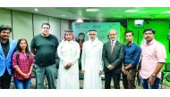 Minister of Culture and Sports H E Salah bin Ganem Al Ali with the staff of Radio Malayalam 98.6 FM. 