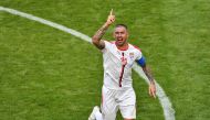 Serbia's defender Aleksandar Kolarov celebrates after scoring from a free-kick during the Russia 2018 World Cup Group E football match between Costa Rica and Serbia at the Samara Arena in Samara on June 17, 2018. AFP / Fabrice COFFRINI