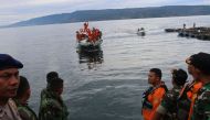 A search and rescue team returns to port with body of a recovered victim after a ferry sank earlier this week in Lake Toba, at Tigaras Port in Simalungun, North Sumatra, Indonesia June 20, 2018 in this photo taken by Antara Foto. Antara Foto/Irsan Mulyadi