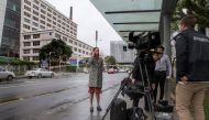 Media wait outside after New Zealand Prime Minister Jacinda Ardern was admitted to Auckland City Hospital in New Zealand, where she will be giving birth to her first child, June 21, 2018. REUTERS/Peter Meecham