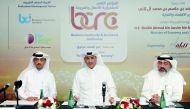 Saud Omar Al Mana (centre), representing the Qatari Businessmen Association;  Abdullatif Ali Al Yafei (left) Chairman of Qatar Business Continuity Forum and Conference President; and Salah Mohammad Al Jaidah, member of the Business Committee during a pres