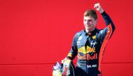 Red Bull's Dutch driver Max Verstappen celebrates winning the Austrian Formula One Grand Prix in Spielberg, central Austria, on July 1, 2018. AFP / Vladimir Simicek
