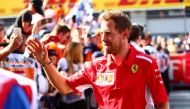 Ferrari's Sebastian Vettel celebrates after finishing in third place REUTERS/Lisi Niesner
