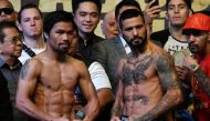 Manny Pacquiao (L) and Lucas Matthysse (R) pose during the weigh-in for their WBA welterweight championship fight in Kuala Lumpur, Malaysia July 14, 2018. REUTERS/Stringer