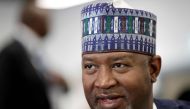 Nigeria's Aviation minister Hadi Sirika speaks folloing a press conference at the Farnborough Airshow, south west of London, on July 18, 2018.  AFP / Adrian Dennis