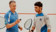 Qatar’s Abdulla Al Tamimi (right) poses for a photograph with Former squash world no. 1, squash legend  Geoff Hunt 