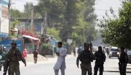 Afghan security forces arrive at an area where explosions and gunshots were heard, in Jalalabad city, Afghanistan, July 31, 2018. (REUTERS/Parwiz)