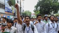Bangladeshi students march along a a street during a student protest in Dhaka on August 4, 2018, following the deaths of two college students in a road accident.  AFP / MUNIR UZ ZAMAN 
