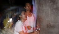 People react following an earthquake in Ampenan district, Mataram, Lombok, Indonesia August 5, 2018, in this photo taken by Antara Foto. Antara Foto/Ahmad Subaidi/ via Reuters