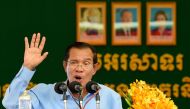 Cambodia's Prime Minister Hun Sen speaks during a visit to a garment factory in Phnom Penh on August 2, 2018. / AFP / TANG CHHIN Sothy