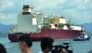 A vessel carrying liquified natural gas cargo from Qatar approaches the new LNG terminal of China National Offshore Oil Corp (CNOOC) in Shenzhen, Guangdong province, China August 1, 2018. Picture taken August 1, 2018. China Daily/ Reuters