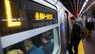 Commuters board an L train for the morning commute in New York on October 24, 2014. reuters/Lucas Jackson