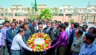 Bangladesh Ambassador Ashud Ahmed, along with embassy officials, placing floral wreaths at the portrait of the Father of the Nation, Bangabandhu Sheikh Mujibur Rahman, at the embassy premises in Doha.