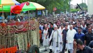 Prime Minister Narendra Modi and India's ruling Bharatiya Janata Party (BJP) President Amit Shah follow the hearse carrying the body of former prime minister Atal Bihari Vajpayee as they move towards the cremation site in New Delhi, India, August 17, 2018