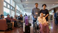 Inter-Korean family reunion participants prepare to depart for North Korea from a hotel resort in Sokcho on August 20, 2018. / AFP / Ed JONES