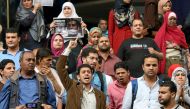 FILE PHOTO: Journalists demand the release of detained journalists in front of the Press Syndicate in Cairo, April 26, 2016. Reuters/Mohamed Abd El Ghany