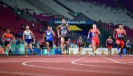 Japan’s Aska Cambridge (C) competes in the final of the men's 4x100m relay athletics event during the 2018 Asian Games in Jakarta on August 30, 2018. AFP / Jewel Samad
