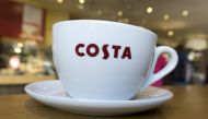 In this file photo taken on November 17, 2017 a mug of coffee is pictured inside a branch of a Costa coffee shop in London. Coca-Cola on August 31, 2018 said it had agreed to buy global coffee chain Costa from its owner Whitbread for £3.9 billion ($5.1 bi