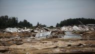 Vegetable greenhouses that were damaged after a flood caused by typhoon Rumbia hit the area are pictured in Shouguang in China's eastern Shandong province on August 31, 2018. typhoon Rumbia left at least 24 dead and 3 missing in Shandong, according to loc