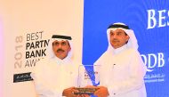 QCB Governor H E Sheikh Abdulla bin Saoud Al Thani (left) presenting the “Best Partner Bank Award” to QIIB’s Chief Executive Officer Dr  Abdulbasit Ahmed Al Shaibei at the event, yesterday.
PIC: Baher Amin/The Peninsula