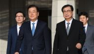Chung Eui-yong (2nd L), head of the presidential National Security Office, Suh Hoon (2nd R), the chief of the South's National Intelligence Service, and other delegators walk to board an aircraft as they leave for Pyongyang at a military airport in Seongn