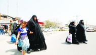 Iraqi women walk in the street after a week of violent protests in Basra, Iraq September 9, 2018. Reuters/Essam al-Sudani
