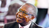 Zimbabwean Finance Minister Mthuli Ncube looks on during the swearing in of new cabinet ministers at State House in Harare, Zimbabwe, September 10, 2018. Reuters/Philimon Bulawayo