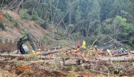 Self defence forces search for missing people in the devastated city of Atsuma on September 9, 2018 after a 6.6-magnitude earthquake hit the northern Japanese island of Hokkaido on September 6. Japan OUT / AFP / JIJI PRESS / Jiji Press