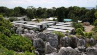 This photograph taken on September 2, 2018 shows a general view of refugee Camp Four on the Pacific island of Nauru. / AFP / Mike LEYRAL 