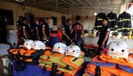 Rescuers ready their gear before Super Typhoon Mangkhut hits the main island of Luzon, in Muntinlupa, Metro Manila, in Philippines, September 13, 2018. Reuters/Erik De Castro


