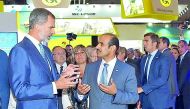 Saad Sherida Al Kaabi, President & CEO of Qatar Petroleum, receiving King Felipe VI of Spain (left) at QP’s pavilion during the official opening of the Gastech exhibition, in Barcelona, Spain.