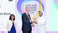 Omar Abdulaziz Al Meer (right), Chief of Business Development at QIIB, receiving the ‘Best Bank in Qatar Award in Liquidity’ on behalf of QIIB during the New Age Banking Summit.