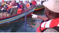 Rescue workers are seen at the scene where a ferry overturned in Lake Victoria, Tanzania September 21, 2018, in this still image taken from video. Reuters TV/via REUTERS