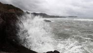 Waves hit the seawalls at a coast of Shibushi city, Kagoshima prefecture, on Kyushu island, on September 29, 2018, as typhoon Trami approaches. AFP / Behrouz Mehri 