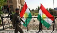 An Iraqi Kurdish man leaves after casting his ballot for the parliamentary election at a polling station in Arbil, the capital of the Kurdish autonomous region in northern Iraq, on September 30, 2018. AFP / Safin Hamed