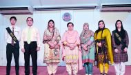 Nargis Raza Otho, Principal of PISQ (centre), with other officials and the newly-elected Head Boy and Head Girl at the campus of the school.