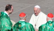 Pope Francis greets cardinals at the end of a mass for the opening of a synodal meeting in Saint Peter's square, at the Vatican, October 3, 2018. REUTERS/Tony Gentile 