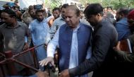 Former Prime Minister Nawaz Sharif arrives to the district High Court ahead of a hearing on treason allegations, in Lahore, Pakistan October 8, 2018. (REUTERS/Mohsin Raza)