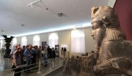 Tourists visit The National Museum of Iran in Tehran on October 09, 2018. / AFP / ATTA KENARE