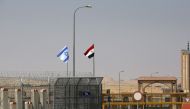 Israeli, Egyptian flags flutter at the Nitzana crossing along Israeli border with Sinai desert of Egypt. (Reuters)