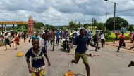 People protest against the results of Ivory Coast's regional and municipal elections in Tiebissou, on October 14, 2018, a day after the vote. AFP / ISSOUF SANOGO