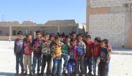 Syrian children are seen at a classroom at the Jisr al-Shughur district of Idlib, Syria on October 6, 2018. Hadi Harrat - Anadolu