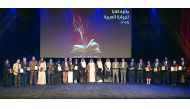 Winners pose with ministers, officials and other resource persons during the award distribution ceremony at the concluding session of the Fourth Katara Festival of Arabic Novels at Katara Cultural Village, yesterday. 