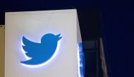 FILE PHOTO: Twitter logo is seen on a sign at the company's headquarters in San Francisco, California.   AFP / JOSH EDELSON