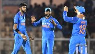 Indian bowler Khaleel Ahmed (L) celebrates with teammates Ravindra Jadeja (C) and captain Virat Kohli after the wicket of West Indies batsman Shimron Hetmyer during the fourth one day international (ODI) cricket match between India and West Indies at the 