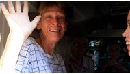 Patricia Fox waves as she leaves the Bureau of Immigration headquarters in Manila. (Reuters file photo) 